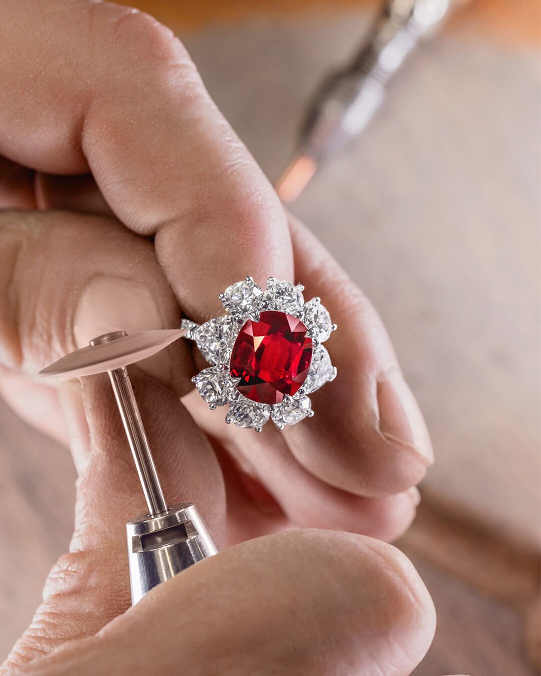 Unique Solitaires - Ruby solitaire ring being constructed in Graff workshop