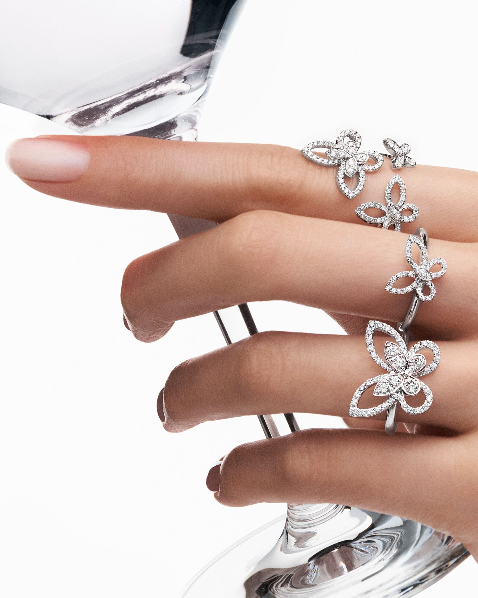 Image of models hands wearing Graff Butterfly Silhouette rings