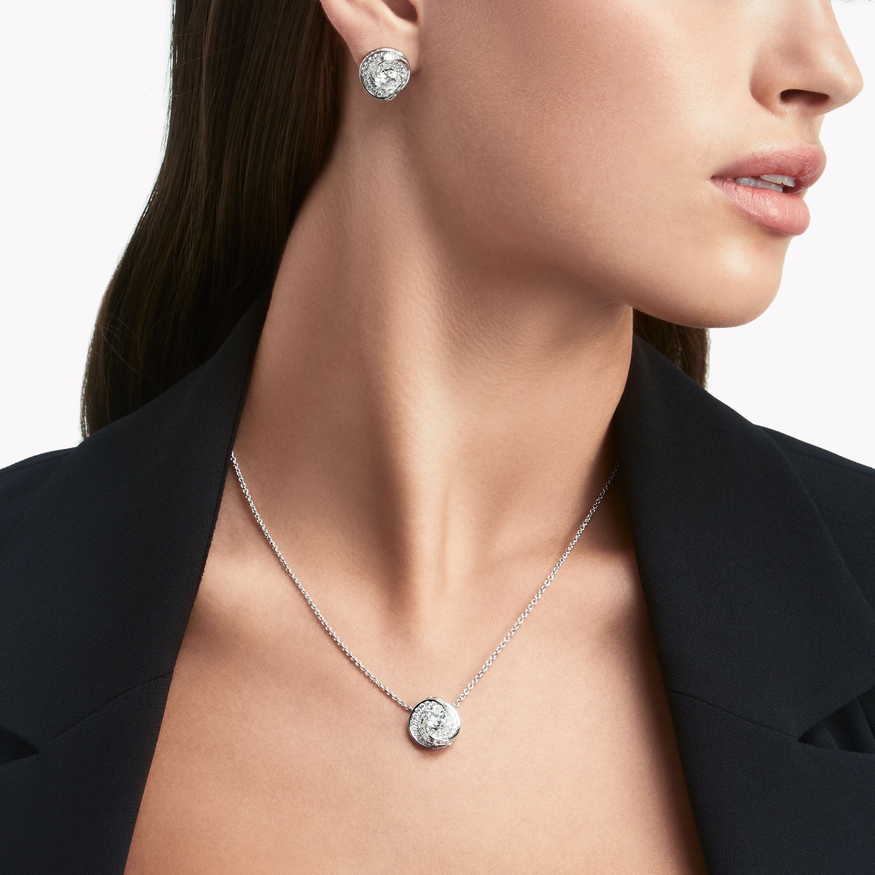 diamond stud earrings and necklace